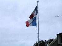 IMG_1515 flag with a star is the Acadian flag -remember Evangeline?
